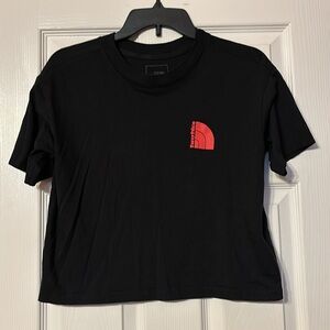 The North face black cropped short sleeve tshirt with red print size xs